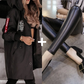 Nueva chaqueta impermeable con capucha y manga larga para mujer