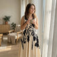 Vestido largo de mujer con estampado floral, cuello en V y cintura retorcida